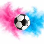 Gender Reveal Fußball mit fein zerstäubtem rosa und blauem Farbpulver